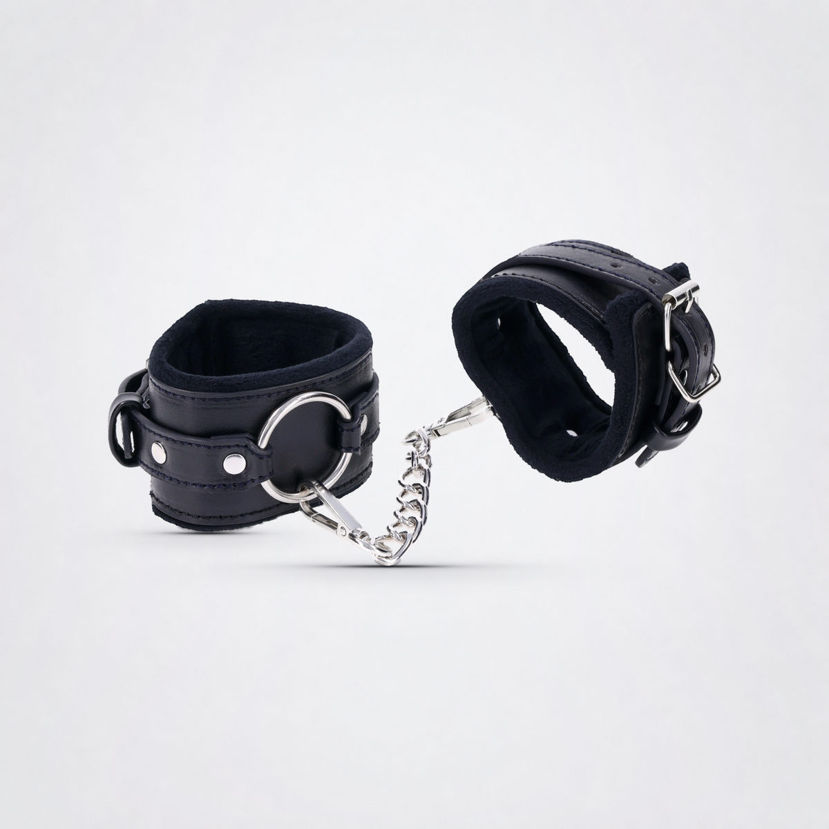 Sportsheets Shadow Handcuffs on The Luv Coach gray studio background