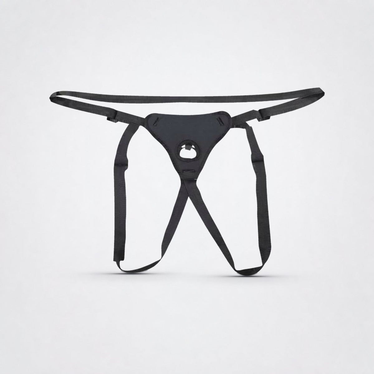 Sportsheets Dual Desires Strap-On Harness | Black on The Luv Coach gray studio background