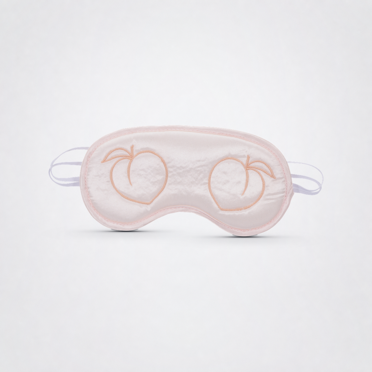 Peaches ‘n Creame Blindfold front view on neutral studio background