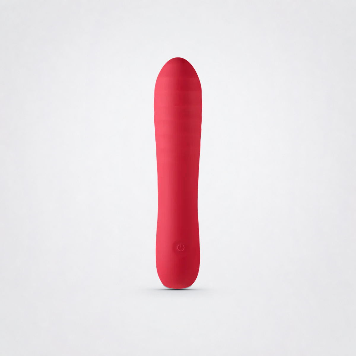 So Berry Tempting red ultra-soft vibrator on a grey studio background