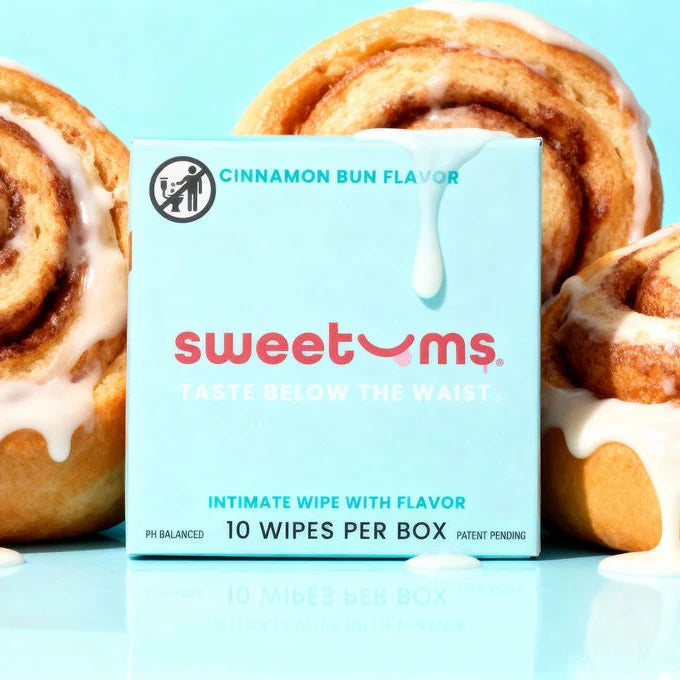 Sweetums Cinnamon Bun box surrounded by cinnamon rolls on teal background