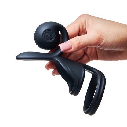 Snail Jovi couples ring and remote in black, held against a white background