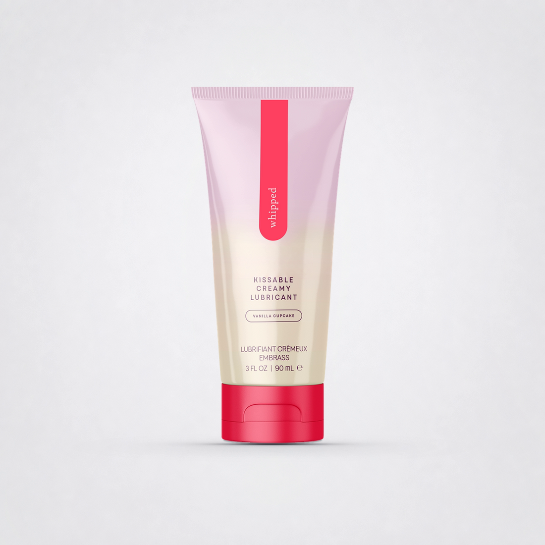 Whipped Vanilla Cupcake lubricant on The Luv Coach approved gray studio background