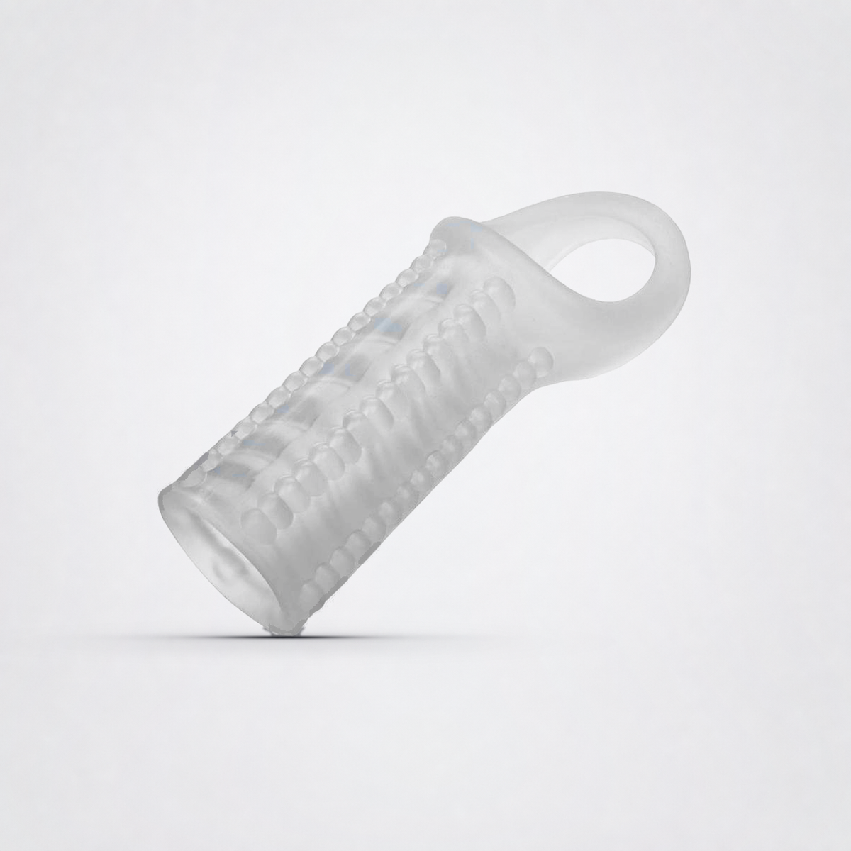 Angled view of the clear textured silicone extender sleeve and support ring