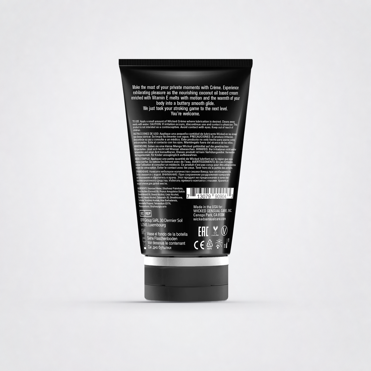 Back label and directions for Wicked Crème stroking and massage cream on The Luv Coach neutral studio background
