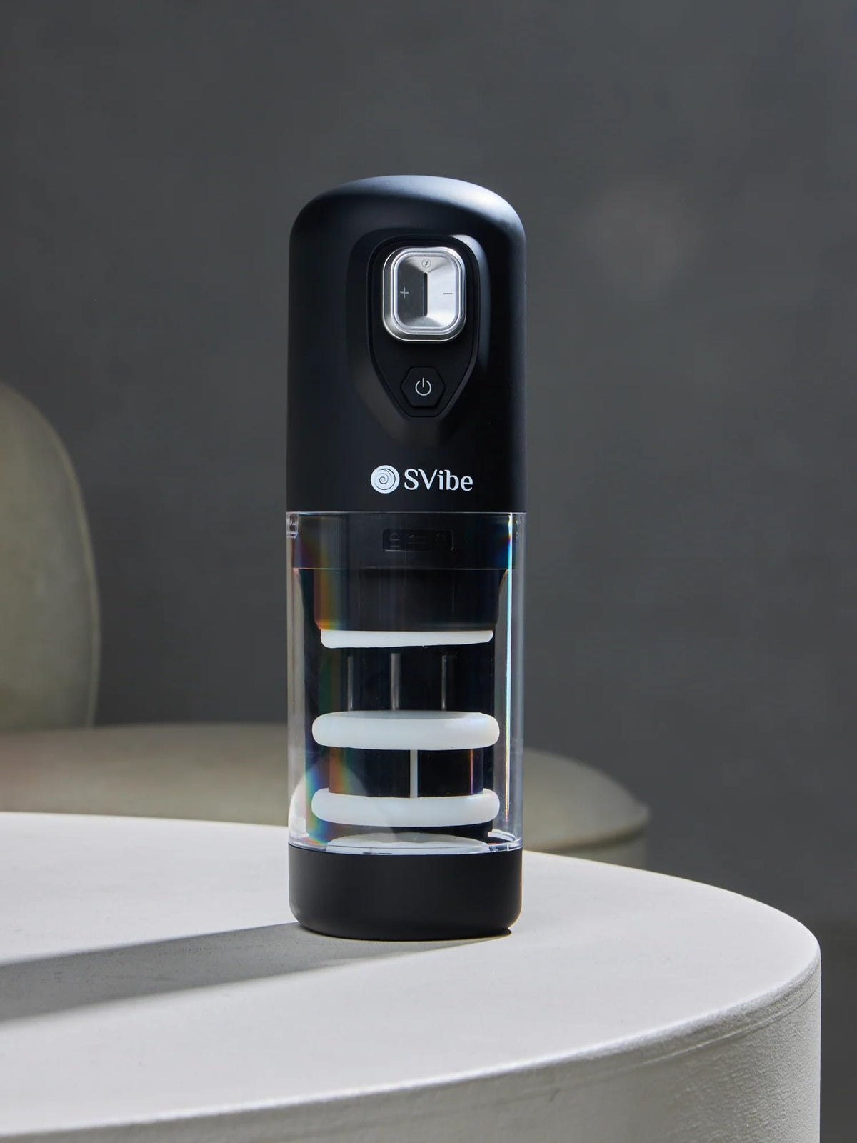 SVibe Spark displayed upright in a modern lifestyle setting