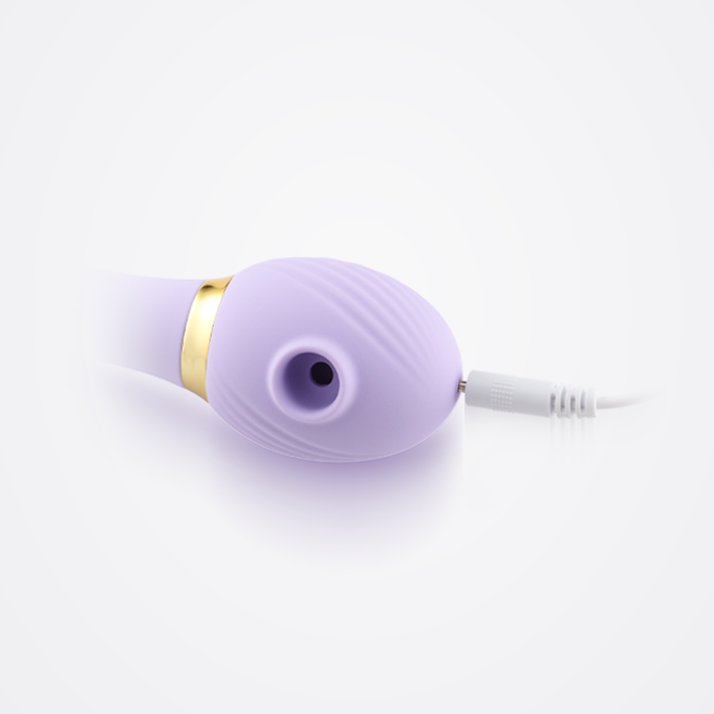 All Inclusive Air Vibe in Purple connected to charging cable