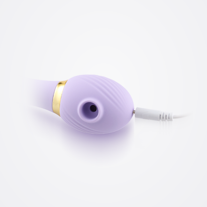 All Inclusive Air Vibe in Purple connected to charging cable