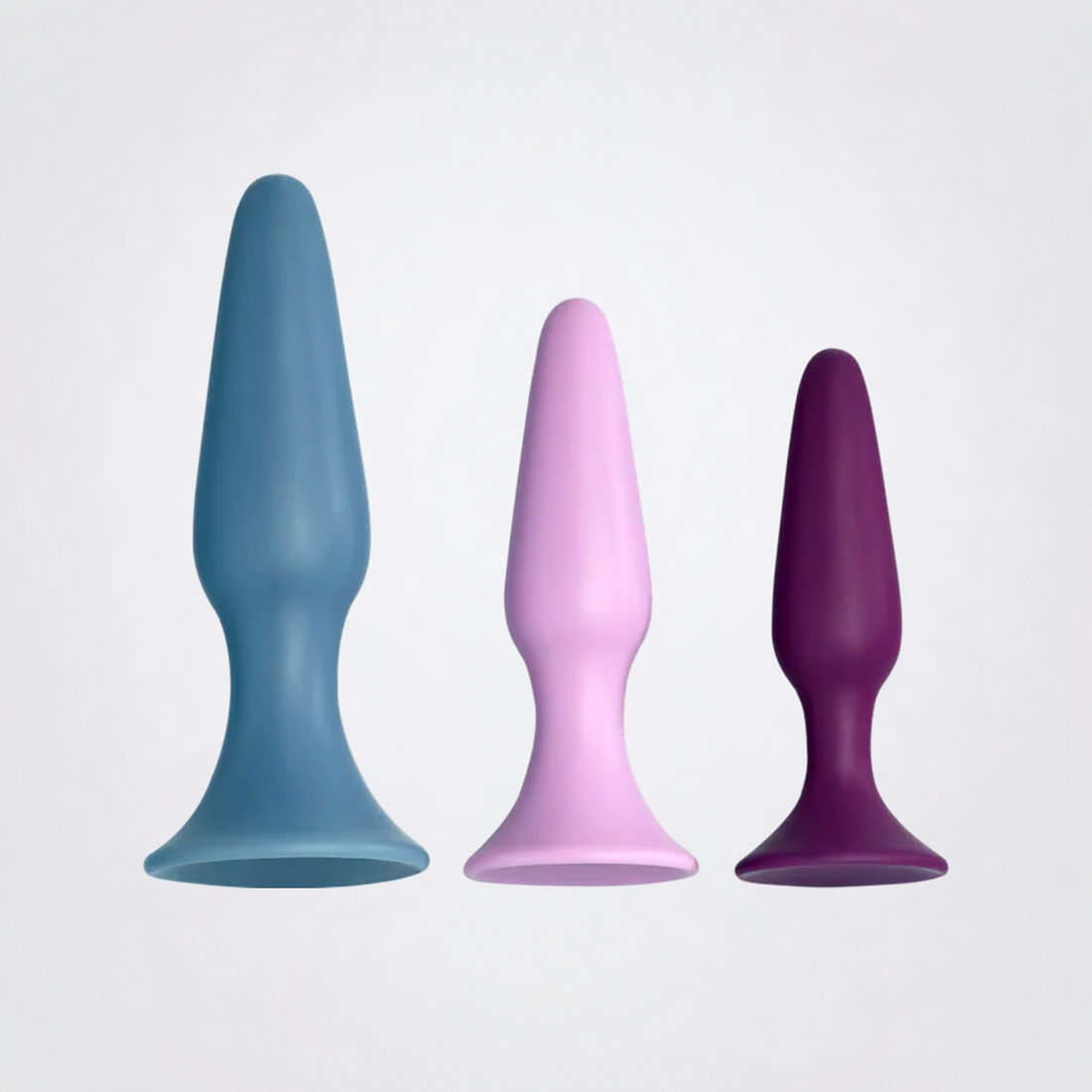 Anal Trainer Kit three-piece silicone set on The Luv Coach approved gray studio background