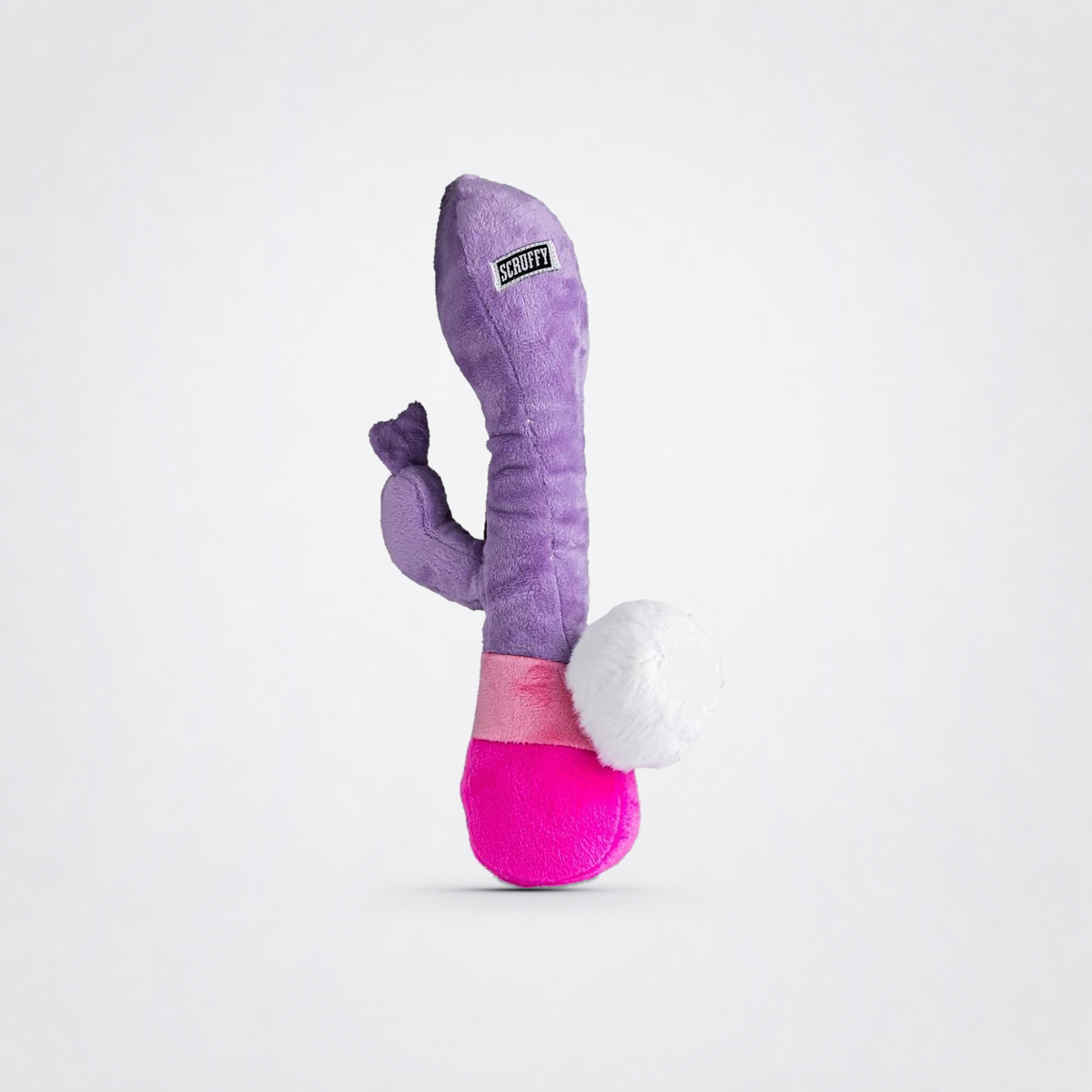 Bunny Vanderpup plush dog toy rear view on the Luv Coach neutral grey studio background