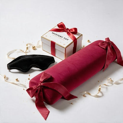 Wrapped Up and Ravished Kinkmas Box with red Ravish pillow, blindfold and mystery toy