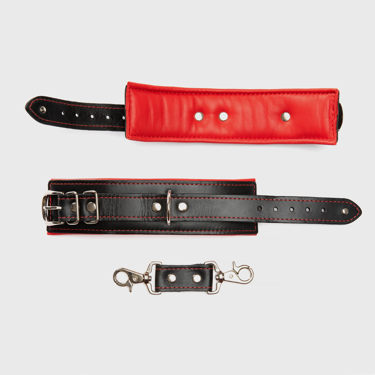 Leather Mercer wrist cuffs showing lining and adjustable straps