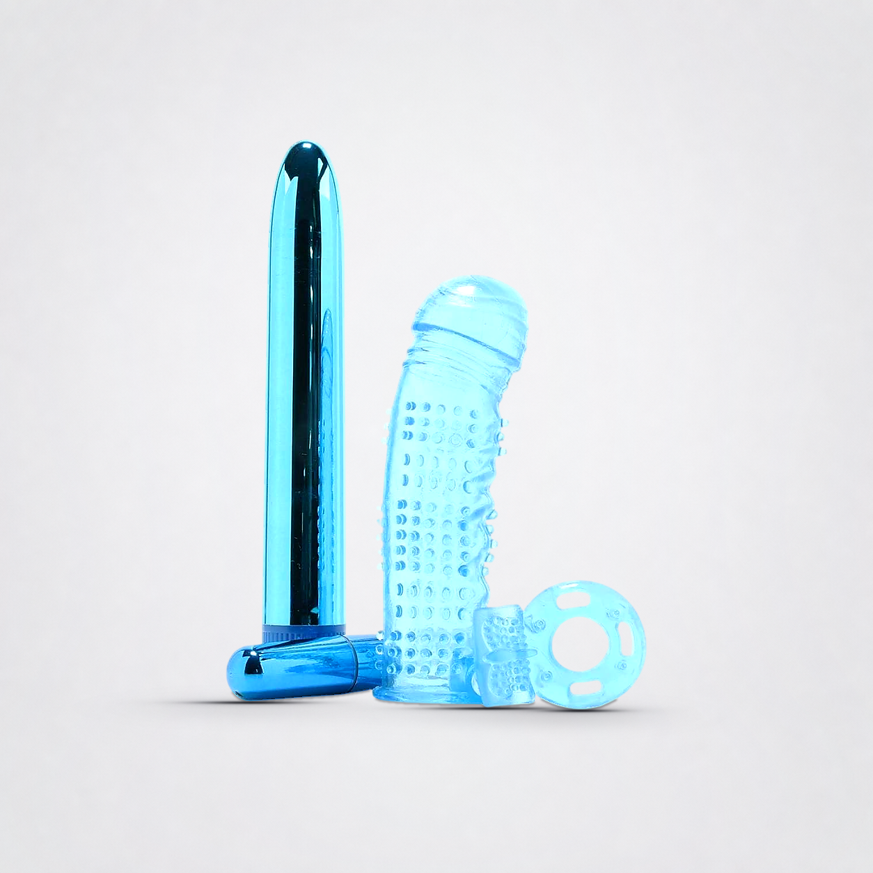 Couples Pleasure Kit in translucent blue on the Luv Coach neutral studio background