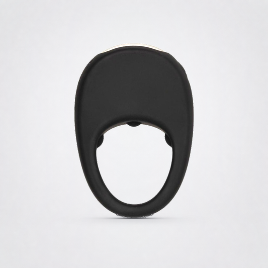 Deep Pleasure couples ring in black on the Luv Coach neutral studio background
