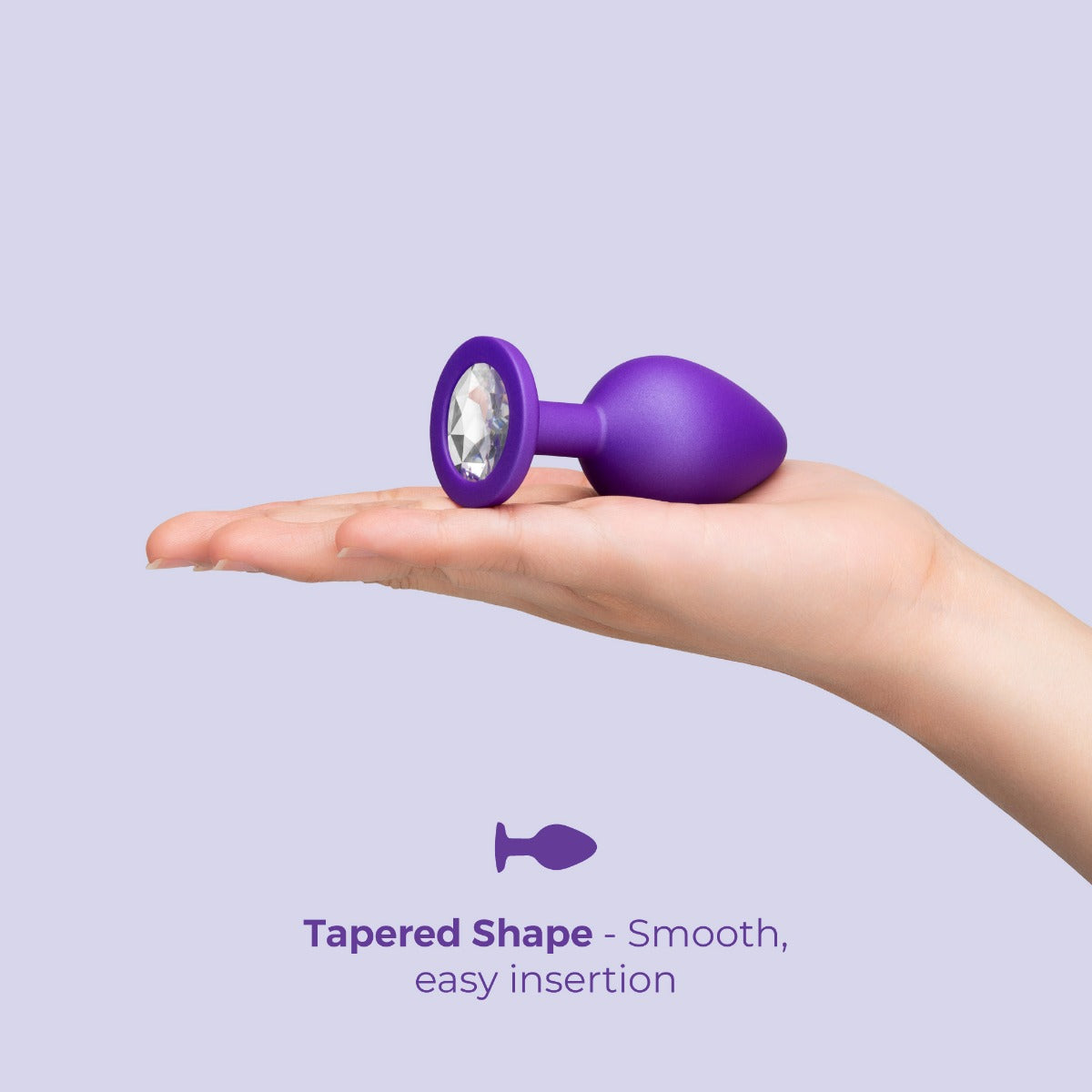 b-Vibe Jeweled Butties Bundle | Purple: Plug shown in a hand for scale