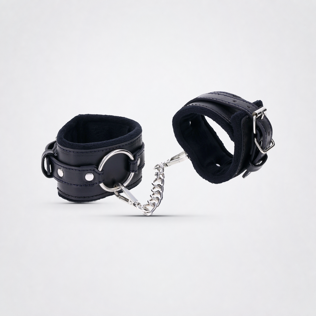 Sportsheets Shadow Handcuffs on The Luv Coach gray studio background