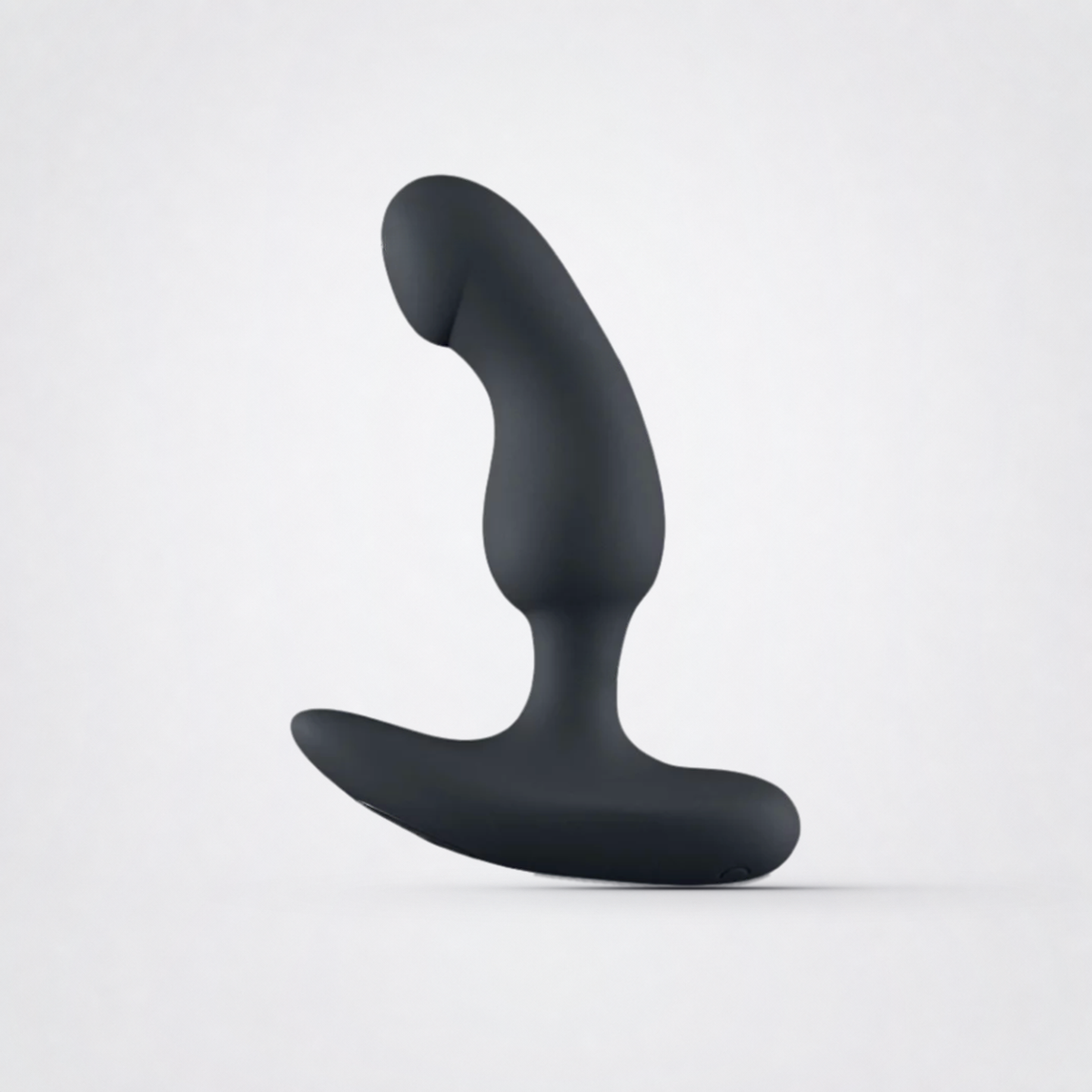 Intimate Intrigue - prostrate massager on a light neutral studio background