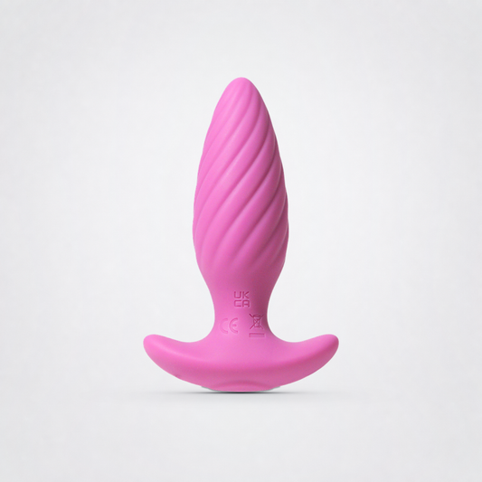 Plot Twist - Silicone Vibrating Butt Plug on a light neutral studio background