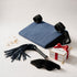 Ho Ho Oh Kinkmas Box with royal blue wedge, wrist cuffs, blindfold, intro flogger and mystery toy