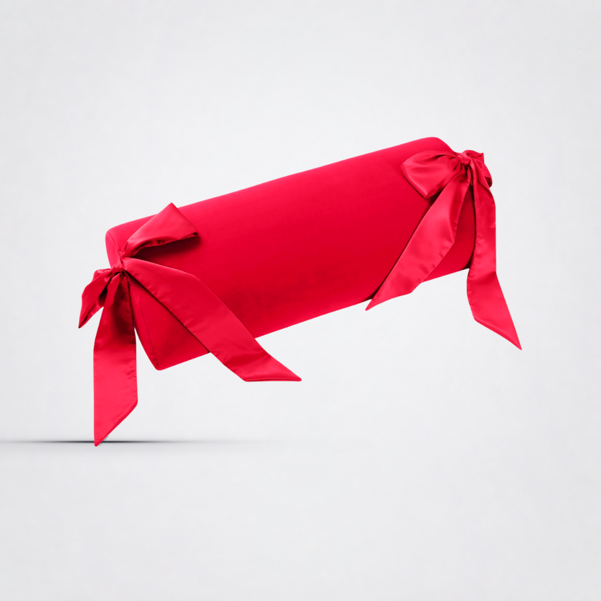 Ravish Bond-age Pillow on The Luv Coach approved neutral studio background