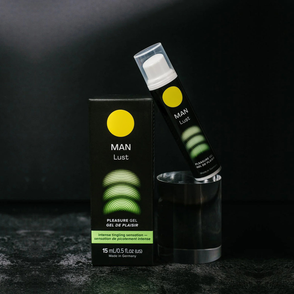 MAN Lust pleasure gel bottle and box in a dark product display