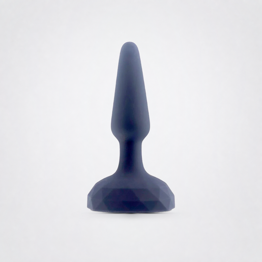 Mesmerize Vibrating Backdoor Plug on a light neutral studio background