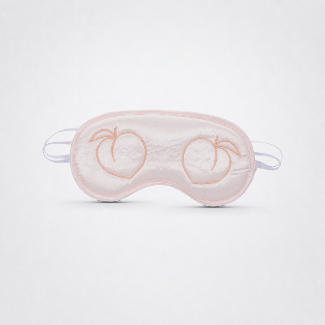 Peaches ‘n Creame Blindfold front view on neutral studio background