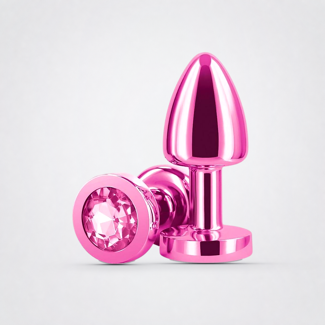Rear Assets Aluminum Anal Plug on a light neutral studio background