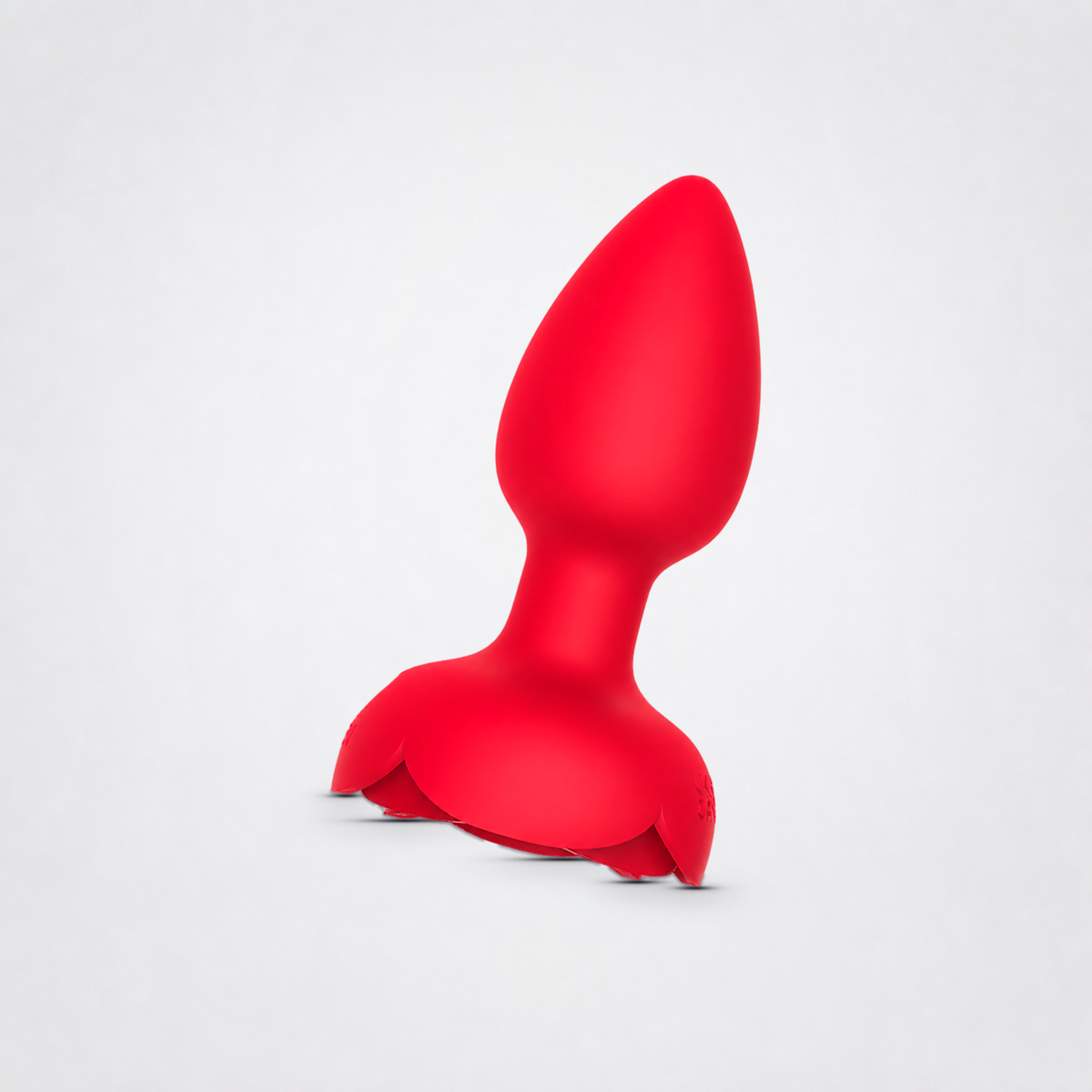 Rosebud Vibing Butt Plug on a light neutral studio background
