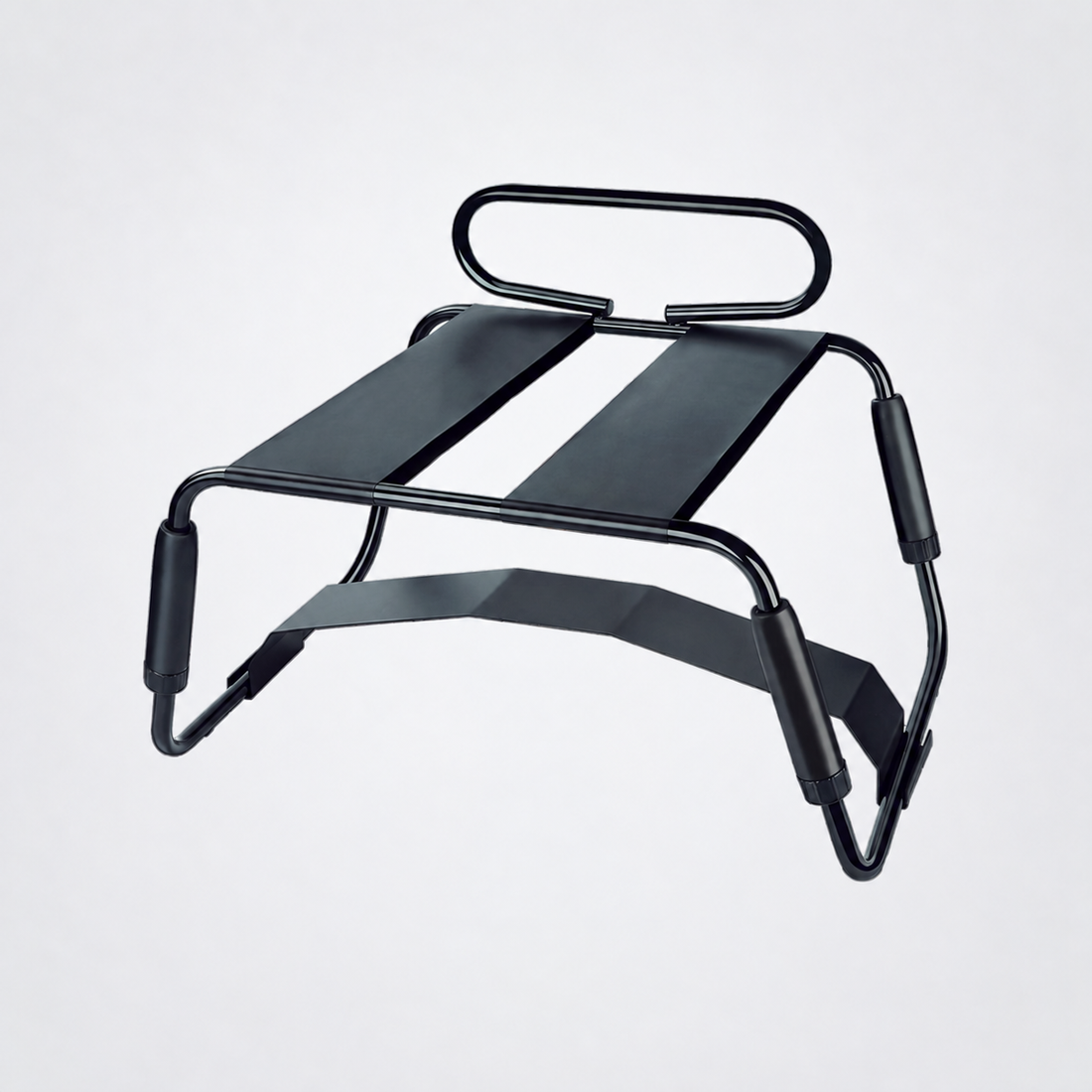 Black Temptasia Surrender Sex Chair on The Luv Coach neutral studio background