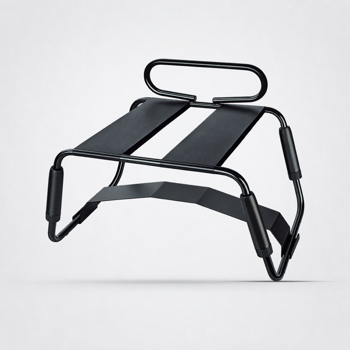 Black Temptasia Surrender Sex Chair on The Luv Coach neutral studio background