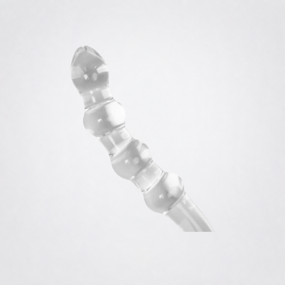 Temp and Tease ribbed glass dildo detail on the Luv Coach grey studio background