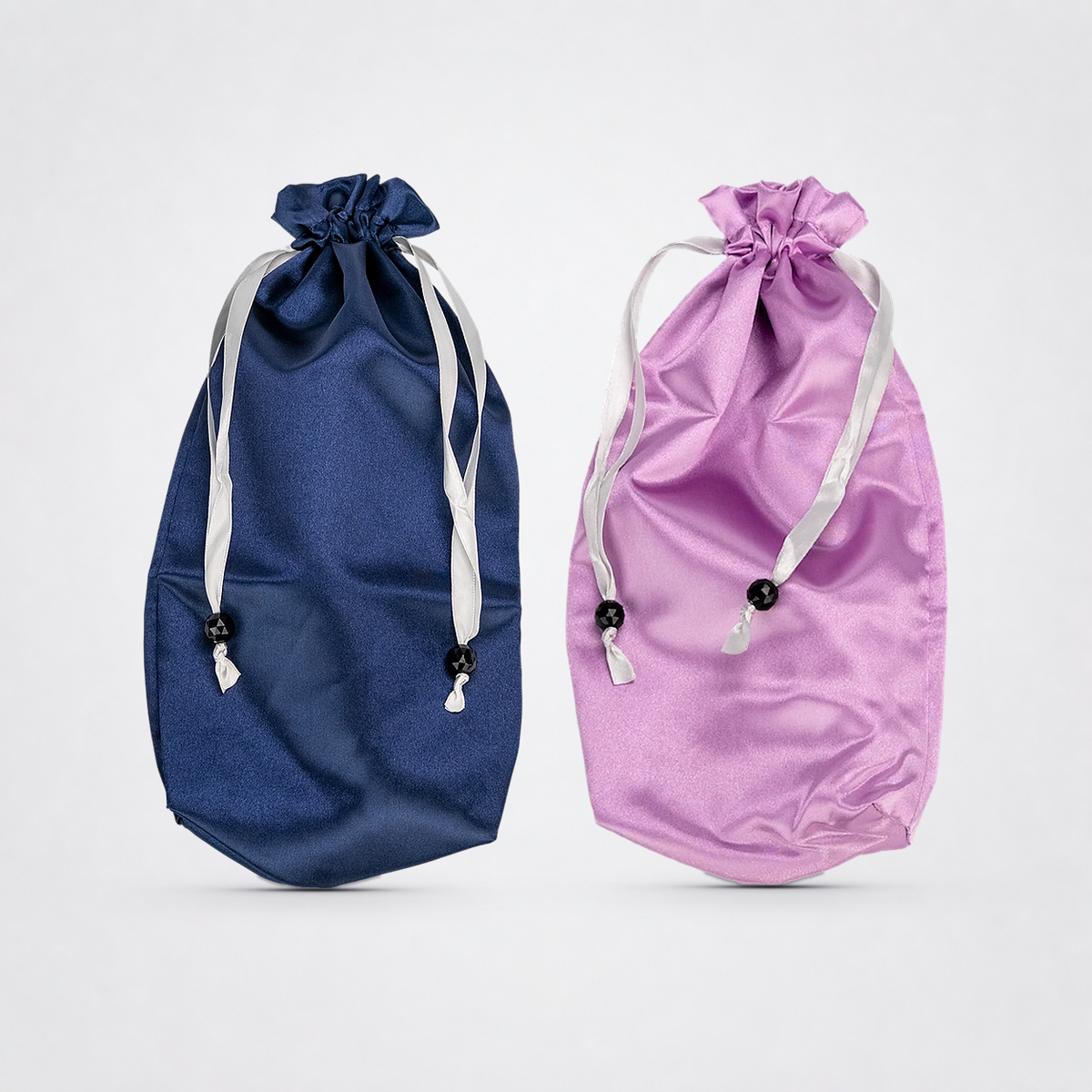 Navy Blue and Purple Toy Totes together on The Luv Coach neutral gray studio background