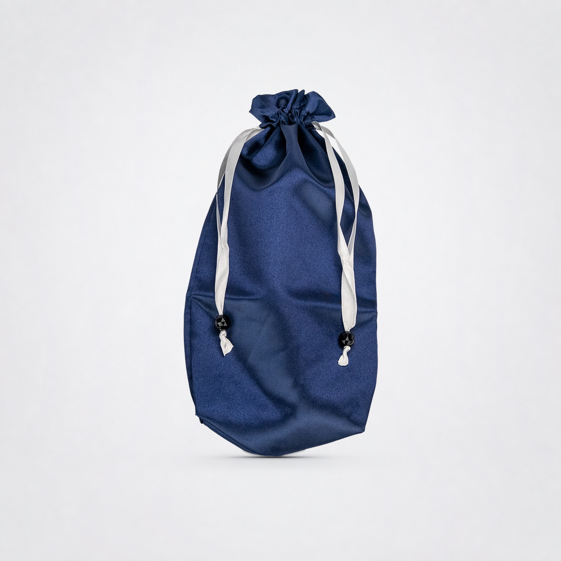 Navy Blue Toy Tote upright on The Luv Coach neutral gray studio background