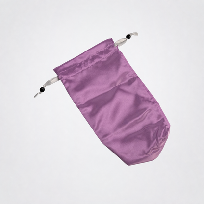 Purple Toy Tote laid flat on The Luv Coach neutral gray studio background
