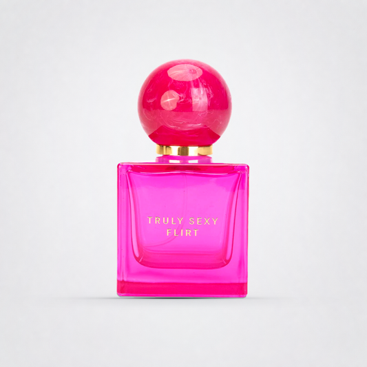 Truly Sexy Flirt Perfume on The Luv Coach approved neutral studio background