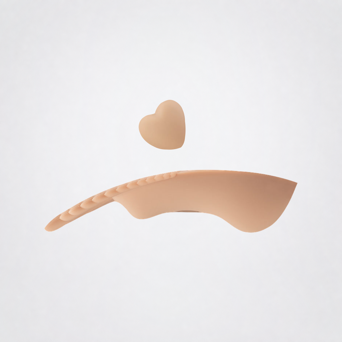 Undercover Lover wearable massager shown from the side with detachable heart magnet