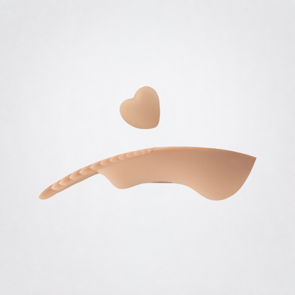Undercover Lover wearable massager shown from the side with detachable heart magnet