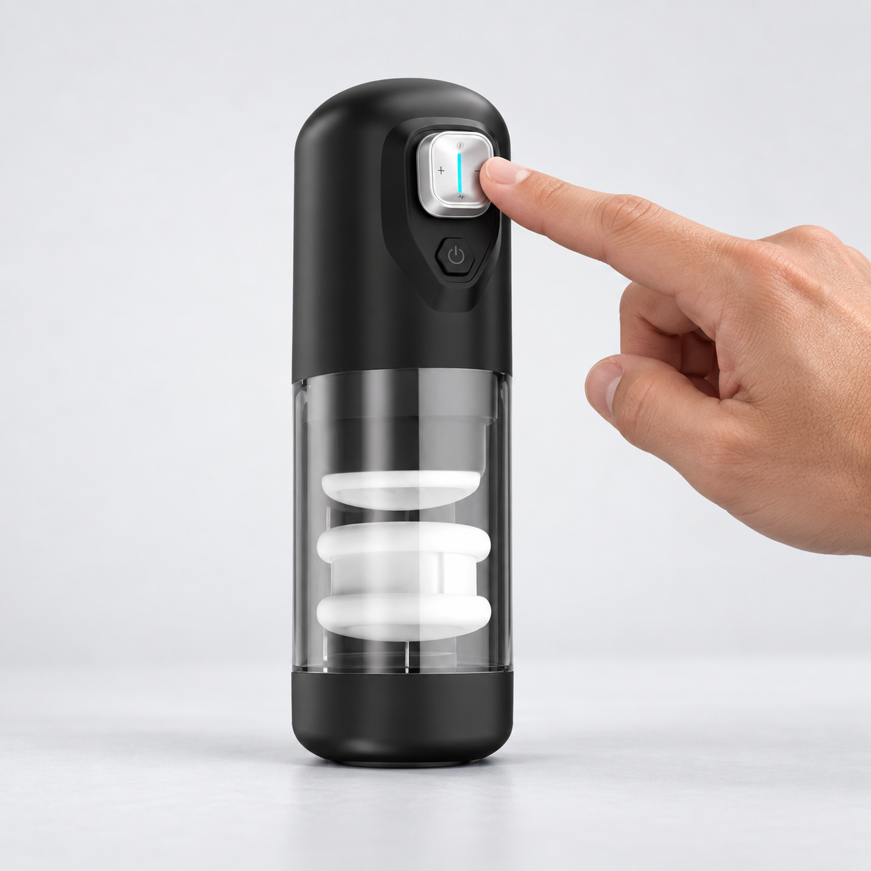 Finger selecting a lower Spark intensity on the silver control pad